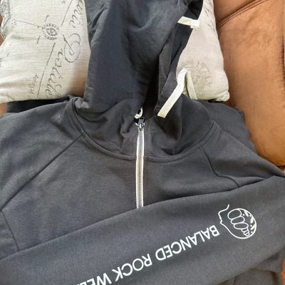 Custom HTV with sleeve print on a vinyl shirt at The Print Plug in Nampa