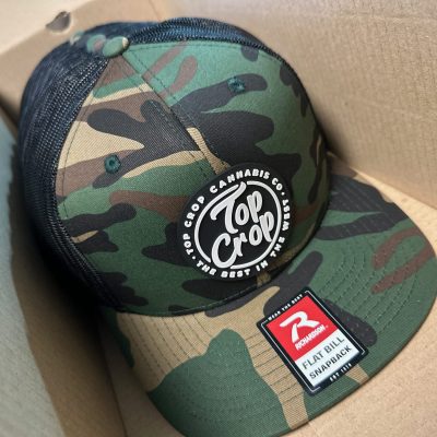 Custom PVC patches on baseball hats for a local dispensary near Nampa, Idaho