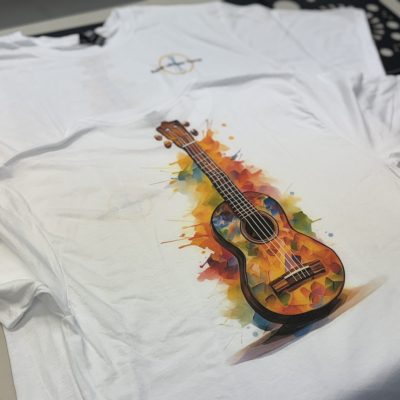 Colorful DTF print of a guitar on a t-shirt