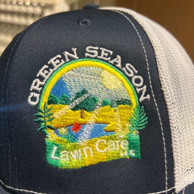 Custom embroidered hat with beautiful intricate design a for a local company in Nampa