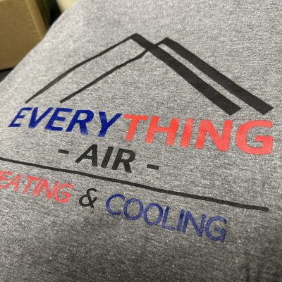 Custom screen printing onto business t-shirts in Nampa